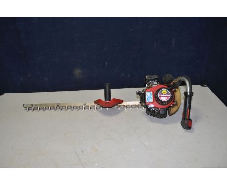 A LAWN FLITE PETROL HEDGE TRIMMER ( engine pulls freely but hasn't been started) 74cm cut