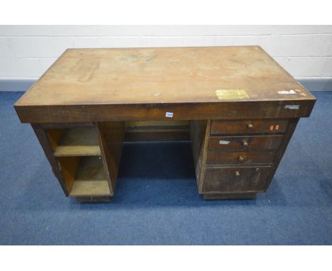 AN EARLY 20TH CENTURY OAK AND RED LEATHERETTE BUTTON SIDED KNEE HOLE DESK, with a bank of four drawers and cupboard, width 13