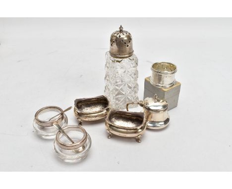 A BOX OF ASSORTED SILVER ITEMS, to include a pair of salts, each of a rectangular baluster form, wavy rim, raised on four cab