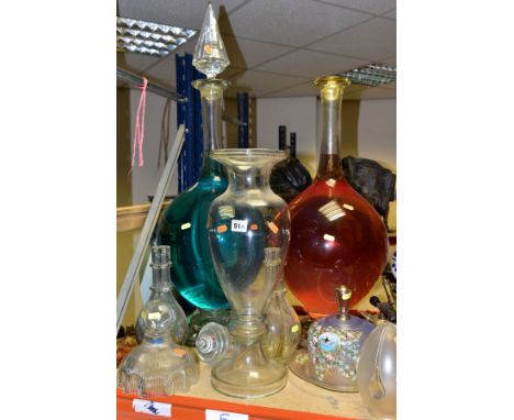 A GROUP OF LARGE GLASS ITEMS, to include two Apothecary/chemists bottles containing coloured liquid, one with damaged stopper