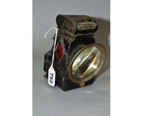 A LITO BELL ROCK OIL FIRED BICYCLE LAMP, by Miller &amp; Co of Birmingham, appears largely complete with lens, adjustable wic