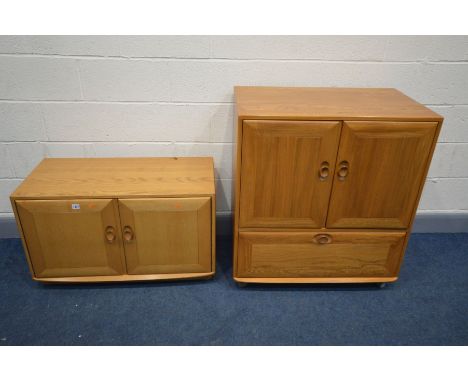 AN ERCOL WISDSOR ELM TWO DOOR TV CABINET with a fall front pull out slide, width 85cm x depth 52cm x height 95cm and a low Er