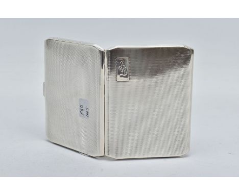 A GEORGE VI SILVER CIGARETTE CASE OF RECTANGULAR FORM, canted corners, engine turned decoration to front and back, the front 