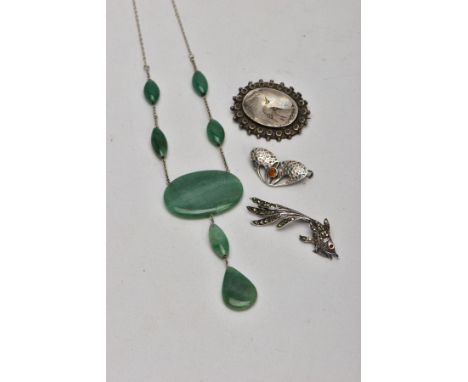 FOUR ITEMS OF JEWELLERY, to include a dyed crackled quartz necklace designed as an oval quartz panel suspending two further q