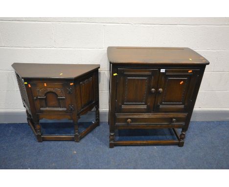 A DARK ERCOL ELM TWO DOOR CABINET with a single drawer, width 79cm x depth 43cm x height 88cm along with an oak linenfold sin