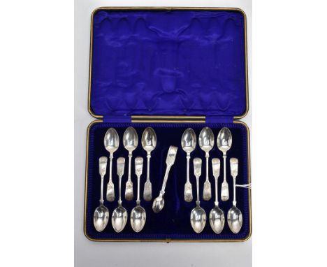 A THIRTEEN PIECE TEASPOON AND SUGAR TONG SET, each teaspoon of a fiddle pattern design, engraved floral detail to the termina