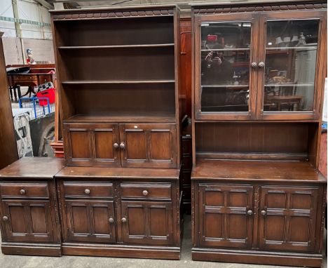 Three items of Ercol furniture; two display cabinets and side cabinet. 