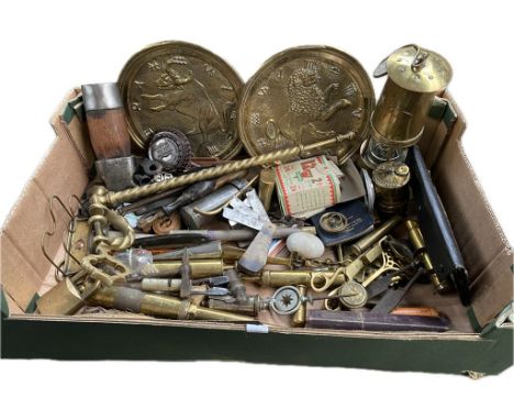 A box of various brass wares includes miners lamp, carbide lamp, blood letting tool, vesta case &amp; various grease guns 