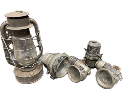 A collection of antique lamps; Veteran Vintage flat tank 4 1/4 inch dia MILLER motorcycle acetylene carbide front headlight l