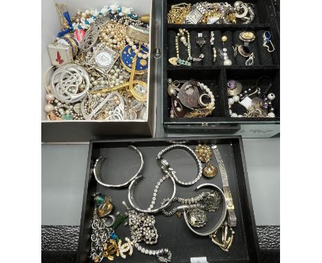 A Large collection of jewellery; Raymond Weil ladies watch, Silver and CZ Bracelet, Jade cross pendant, Pewter Celtic design 