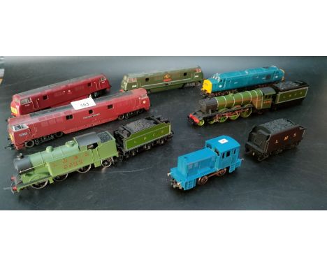 A collection of model trains; Hornby flying Scotsman, western courier diesel shunter &amp; British railway diesel shunter 