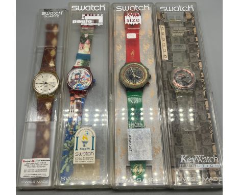 A Lot of four various vintage boxed Swatch watches 