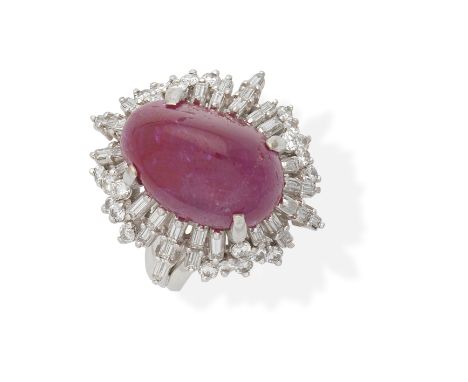 RUBY AND DIAMOND DRESS RING, CIRCA 1960The cabochon ruby, weighing 21.21 carats, within a surround of brilliant and baguette-