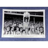 Bobby Kerr signed 16x12 Sunderland 1973 FA Cup black and white print. Captain Bobby Kerr holds aloft