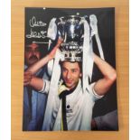 Football. Ossie Ardiles Signed 16x12 colour photo. Photo shows Ardiles celebrating with the FA