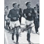 Football. Martin Peters and Geoff Hurst Signed 10x8 black and white photo. Photo shows the pair
