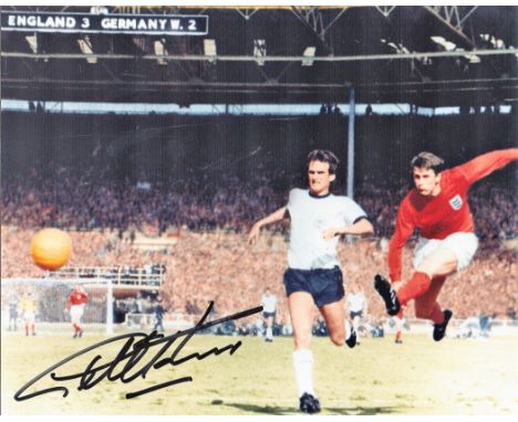 Football. Geoff Hurst Signed 10x8 colour photo. Photo shows the Hurst Shooting for goal against West Germany. Good condition 