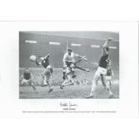 Cliff Jones signed 16x12 black and white print. Welsh wizard in typical action against West Ham at