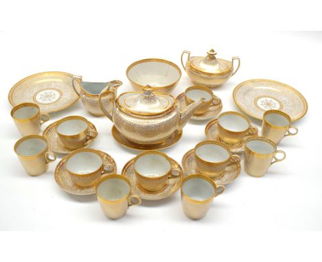 A Chamberlains Worcester tea service, in gilt vermicelli design, to include: teapot on stand, covered sucrier, creamer, bowl,