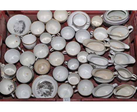 A large quantity of black transfer printed tea ware, including: a sucrier; jugs; and tea cups, 19th Century.