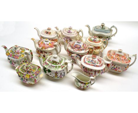 Ten printed and hand-coloured 19th Century teapots, one with covered sucrier and jug, mainly decorated in chinoiserie designs