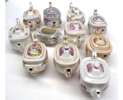 Printed and hand-coloured teapots, one with sucrier (missing lid).  (11)