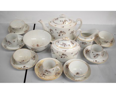 A Newhall part tea service, to include: teapot on stand, sucrier, milk jug, slop bowl, four tea bowls, three tea cups and sev