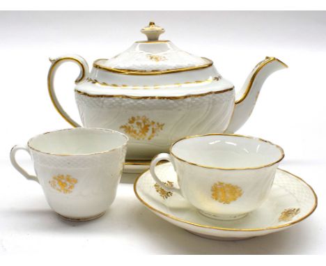 A Swansea part tea service, to include: teapot on stand, tea cup, saucer and coffee can, all decorated in gilt.  (5)