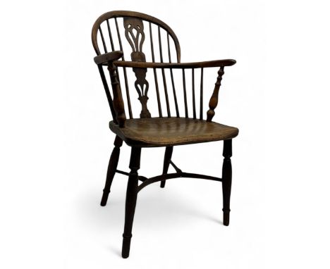 19th century elm and yew wood Windsor armchair, low comb back with shaped and pierced splat, dished seat on turned supports u