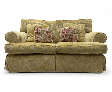 Contemporary two-seat sofa, upholstered in damask fabric with a pale gold floral pattern, rolled arms with covers, loose back