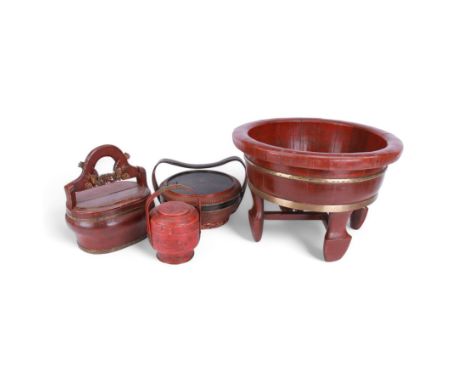 Late 19th century Chinese lacquer wear wash bowl, the red lacquer highlighted with gilt bands, upon carved legs, together wit