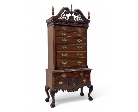 Early 20th century miniature mahogany Chippendale-design tallboy, scrolling swan-neck pediment with intricate fretwork and th