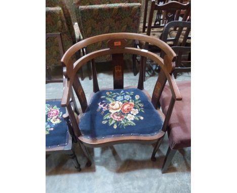 An Art-Nouveau/secessionist mahogany and inlaid tub elbow chair with tapestry seat