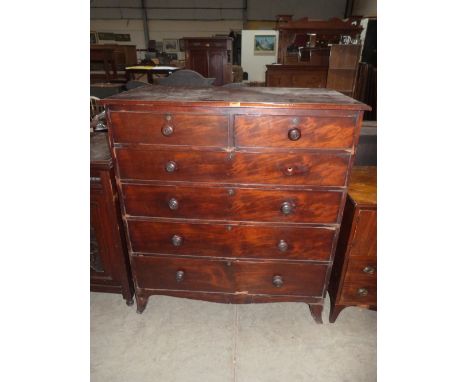 A George III mahogany chest with two short over four long drawers on played bracket feet. 42' wide
