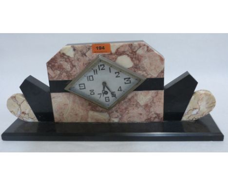 An Art-Deco slate and marble mantle clock. 19' wide