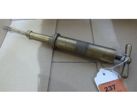 An Enots brass patent grease gun. c.1920s/30s