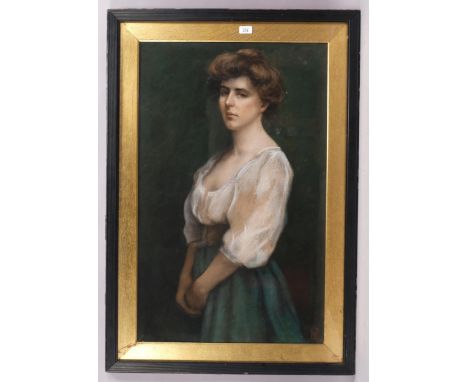 Portrait of a woman, circa 1900, coloured pastels, signed with monogram, 90cm x 55cm, framedA few very light surface spots, g
