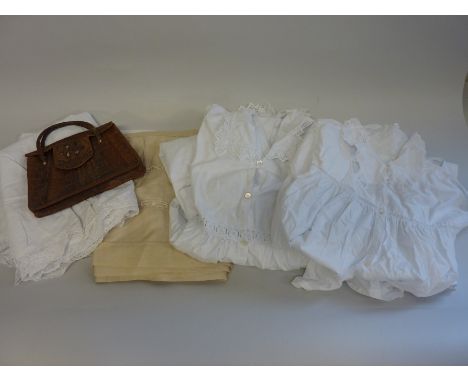 A COLLECTION OF VINTAGE LINEN, to include night shirts and embroidered table cloth and one vintage crocodile skin handbag