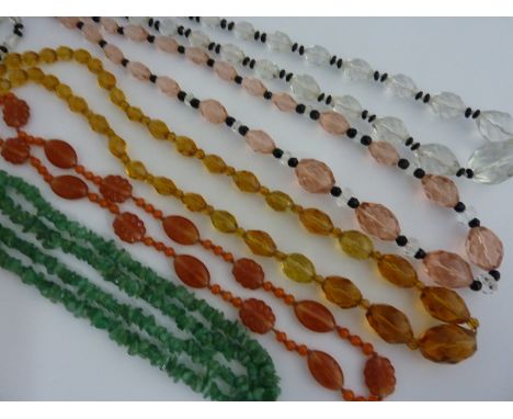 FIVE VINTAGE NECKLACES, to include a 1920's adventure quartz necklace, a carved cornelian glass necklace, a 1950's necklace w