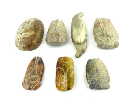 Six Hongshan style carved jade cicada pendants sold together with a Ming style jade cicada on leaf pendant. (7)