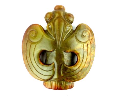A good Hongshan style carved jade pendant depicting a stylised Chinese bird in green opaque jade, 10.5cm.