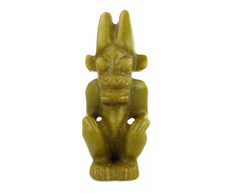 A rare sage green carved jade figure of a Chinese demon, in the early Han Dynasty style, 16cm high.