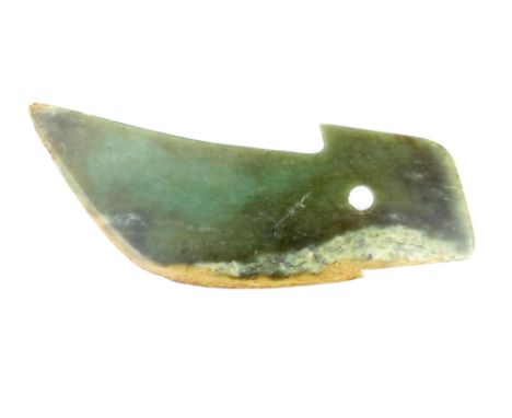 A Chinese translucent green jade archaic form blade, 20 x 7cm.