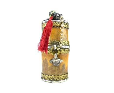 A rare relic container of metal mounted horn with white metal cover, tassel and bead, internal base of turquoise containing a