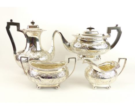Large Victorian four piece silver hallmarked tea service comprising teapot and coffee pot with ebonised handles and finials, 