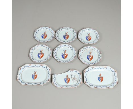 Probably 18thc, each item with an armorial crest at the centre of two animal heads above a shield. Comprising two rectangular