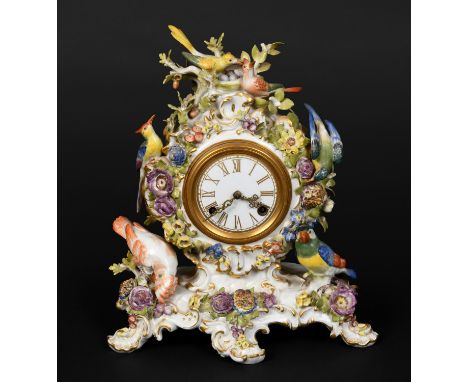 20thc, the enamel dial with gilt numerals and striking on a bell, the elaborate case with various birds including a Parrot an