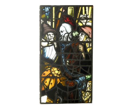 From the studio of Patrick Reyntiens, one of rectangular form the coloured glass panel with a variety of faces (80cms by 43cm