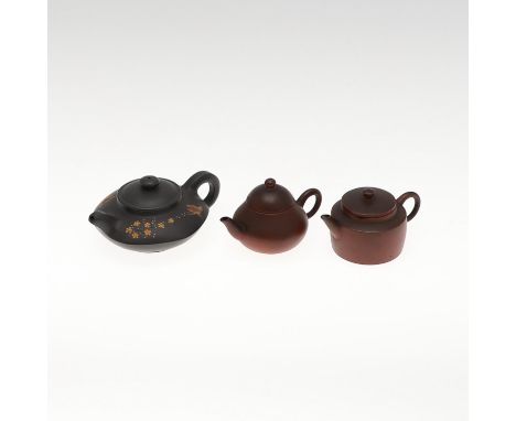 Probably Republic Period, Including two miniature stoneware teapots one with dome top lid, both with impressed marks to the b