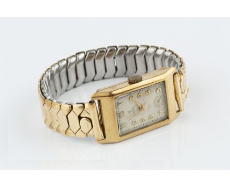 A GENTLEMAN'S 9CT GOLD CASED WRISTWATCH BY TUDOR, the rectangular silvered dial with gilt Arabic numerals and subsidiary seco